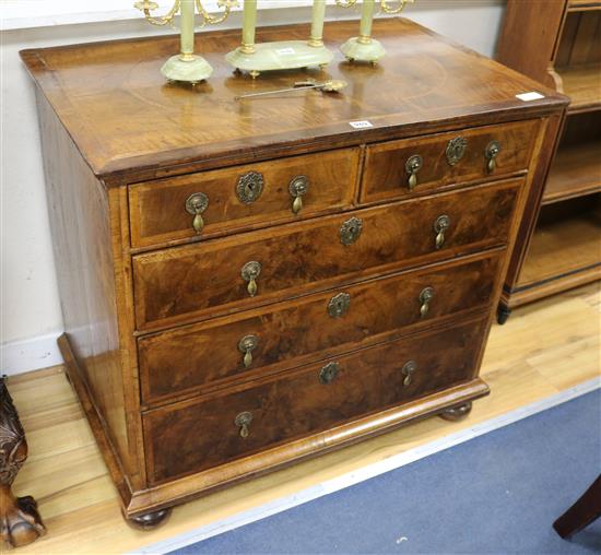 An 18th century walnut chest of three long and two short drawers W.87cm